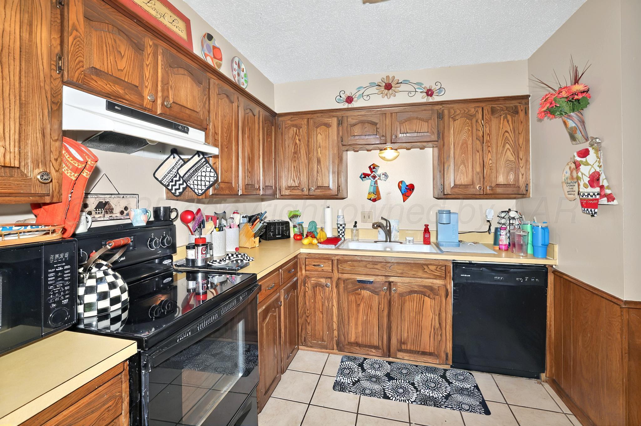 6225-6227 Belpree Road Amarillo, TX 79106 - Photo 24 of 31 24-6227-Kitchen