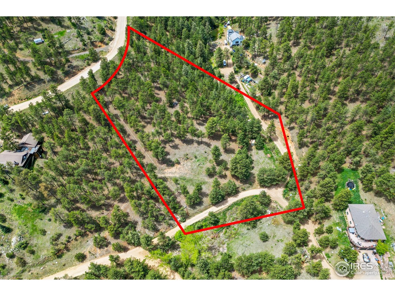 375 Arroyo Chico Boulder, CO 80302 - Photo 18 of 42 This 2.55-acre parcel offers elevation, orientation, and space-designed by nature, ready for you.Open meadows stretch into the trees, offering light, warmth, and flexibility for your build.