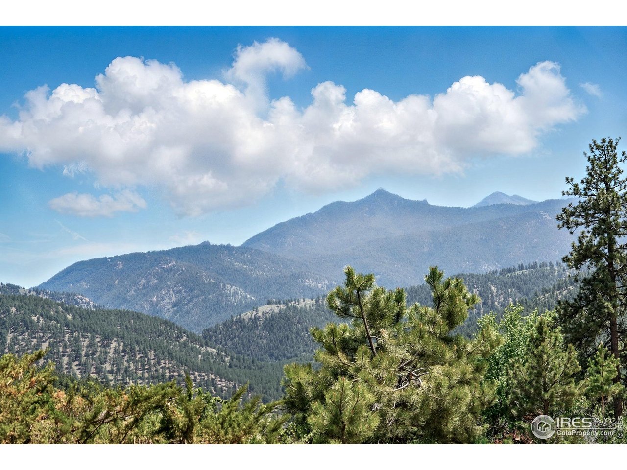 375 Arroyo Chico Boulder, CO 80302 - Photo 22 of 42 Bear Peak rises in the distance-a reminder that even in stillness, adventure surrounds you.