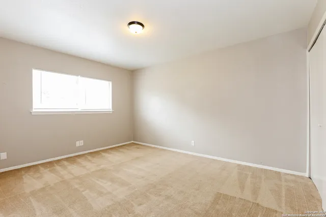 an empty room with a window