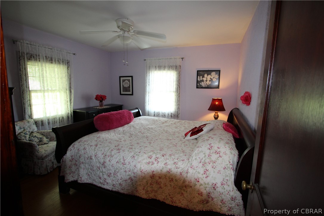 1247 Gdn Crk Road Mathews, VA 23109 - Photo 27 of 49 a bedroom with a bed and window