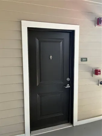 a bathroom with a glass door