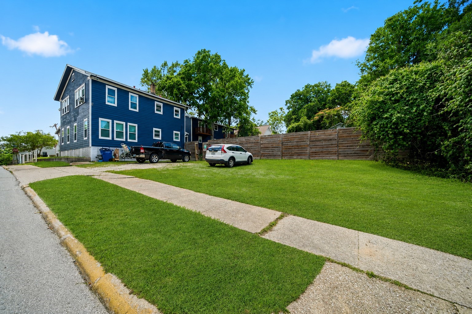 1302 20th Street Huntsville, TX 77340 - Photo 4 of 26 a view of a building with a yard