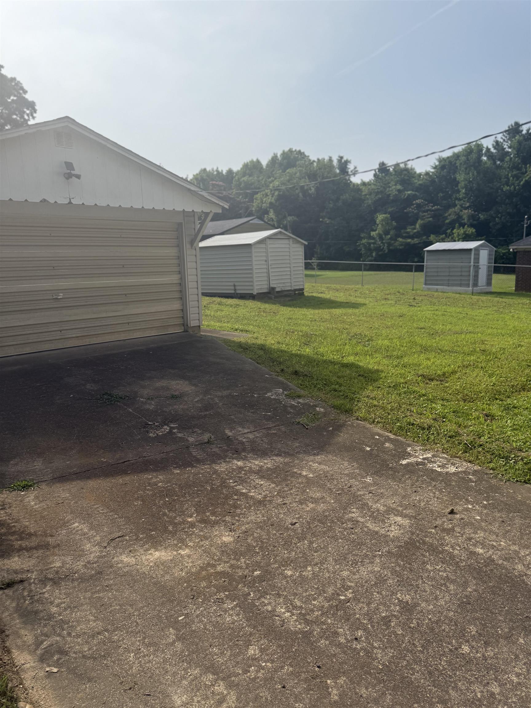 4005 Sewanee Road Memphis, TN 38109 - Photo 7 of 8 a view of a house with a yard