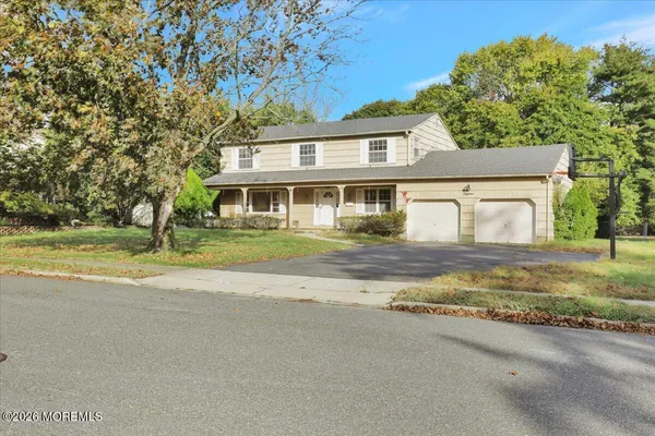 a house with trees in the background