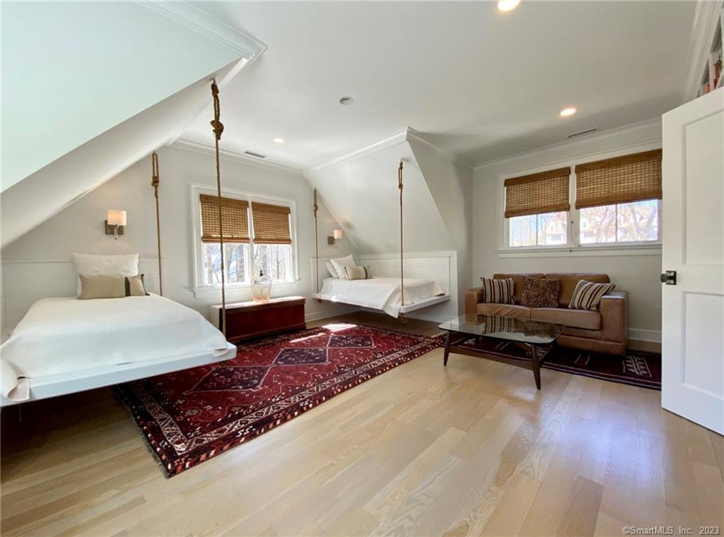 7 Whaling Road Darien, CT 06820 - Photo 20 of 34 a bedroom with a bed window and couch