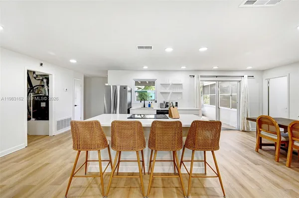 a view of a dining room with furniture