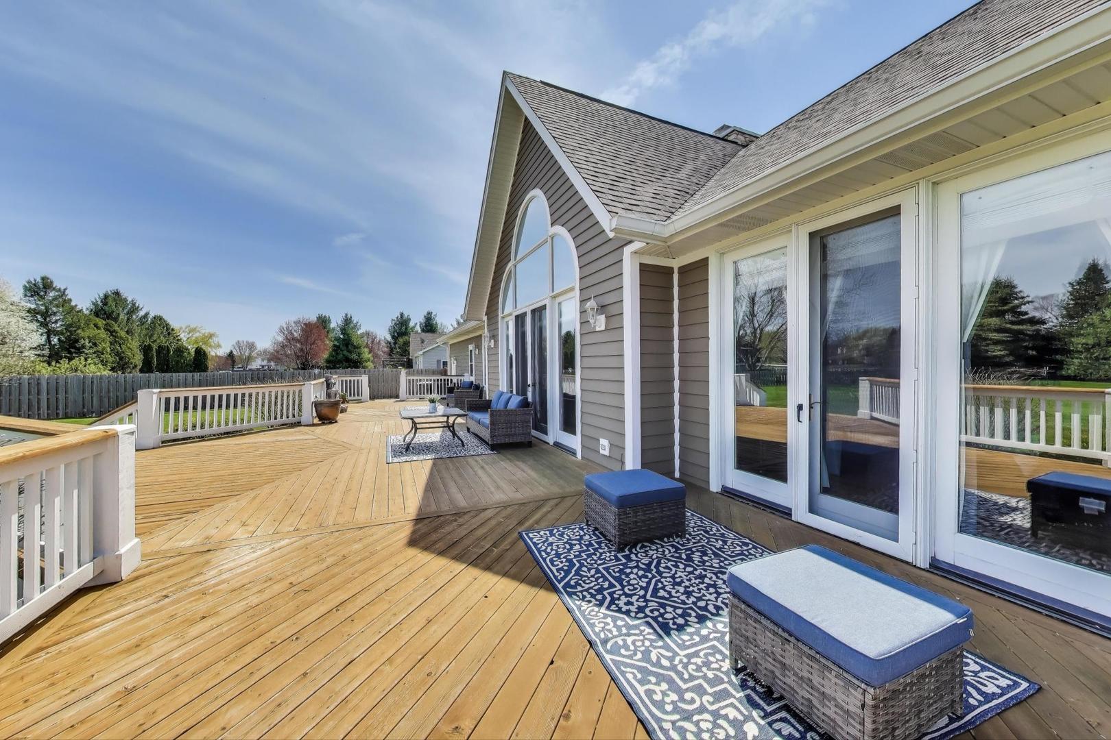 2502 Hidden Trail Spring Grove, IL 60081 - Photo 36 of 51 a view of a patio with swimming pool table and chairs