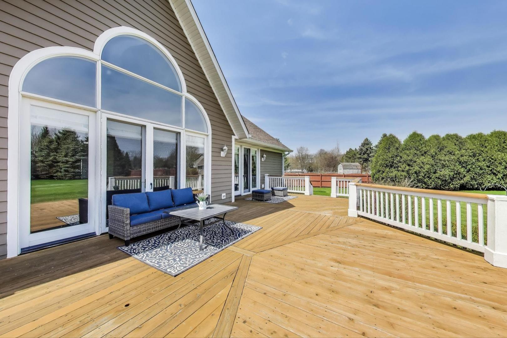 2502 Hidden Trail Spring Grove, IL 60081 - Photo 37 of 51 a swimming pool with outdoor seating and yard