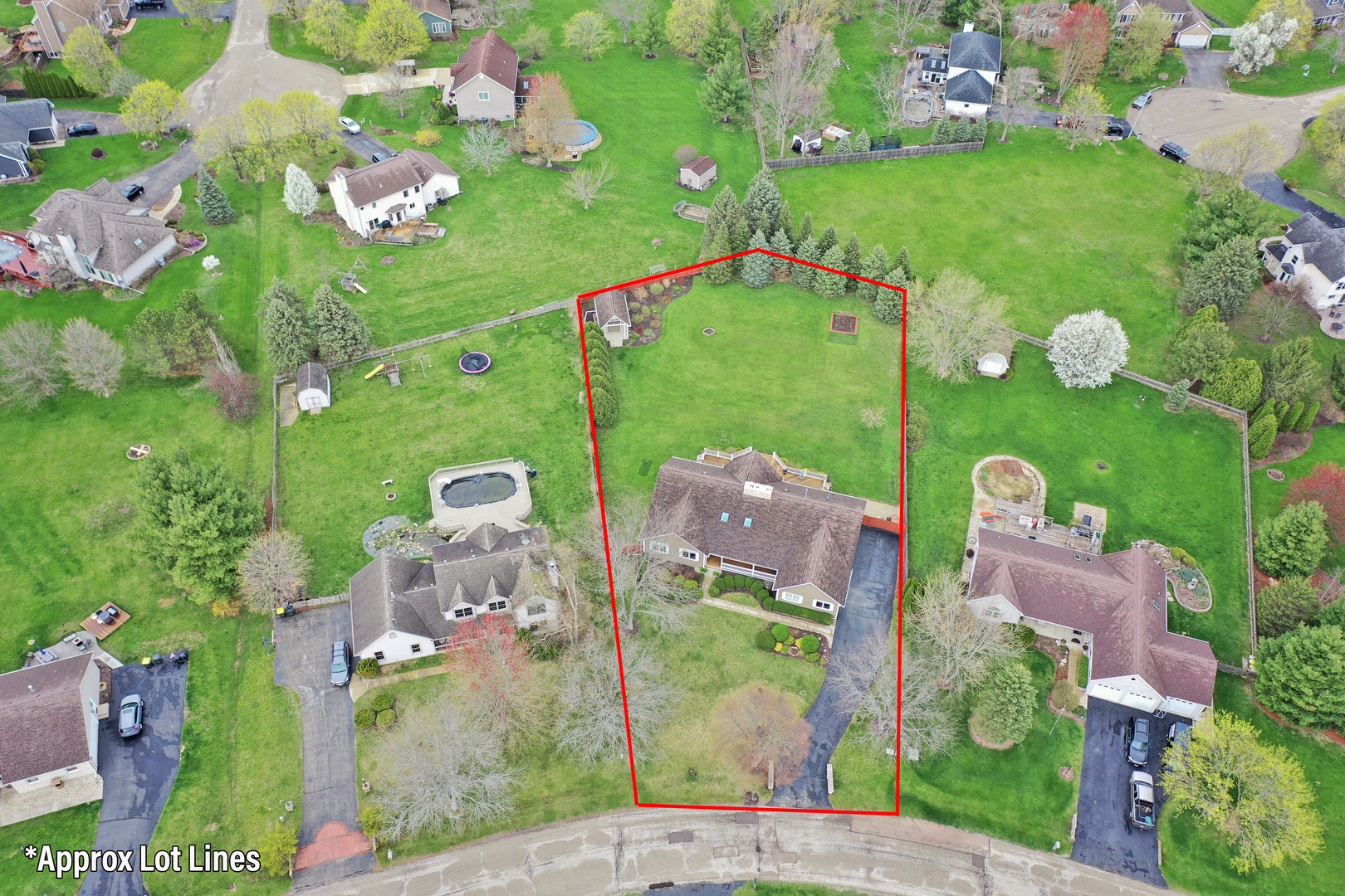 2502 Hidden Trail Spring Grove, IL 60081 - Photo 50 of 51 a aerial view of a house with a garden and yard