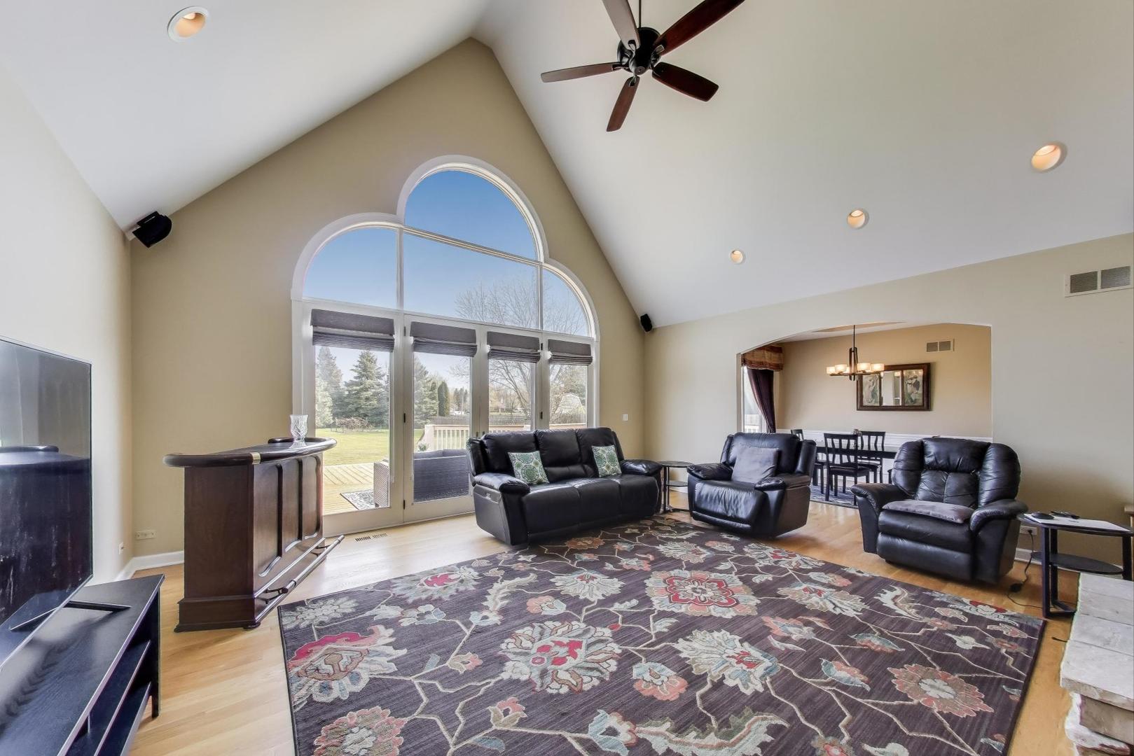 2502 Hidden Trail Spring Grove, IL 60081 - Photo 8 of 51 a living room with furniture or couch and a flat screen tv