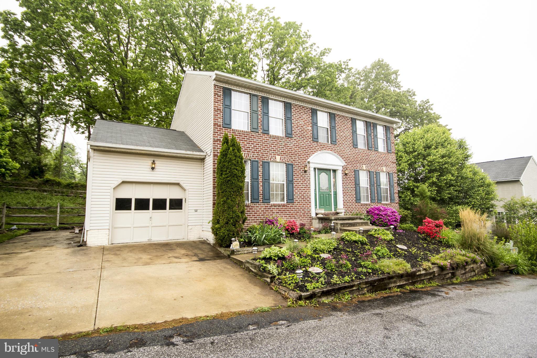 4309 Mispillion Road Baltimore, MD 21236 - Photo 2 of 29 a front view of a house with a yard