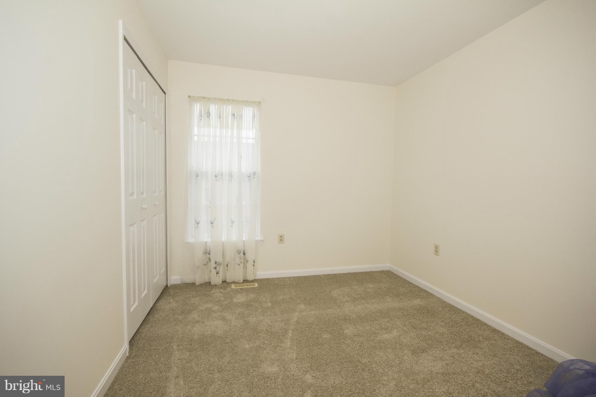4309 Mispillion Road Baltimore, MD 21236 - Photo 17 of 29 an empty room with a window