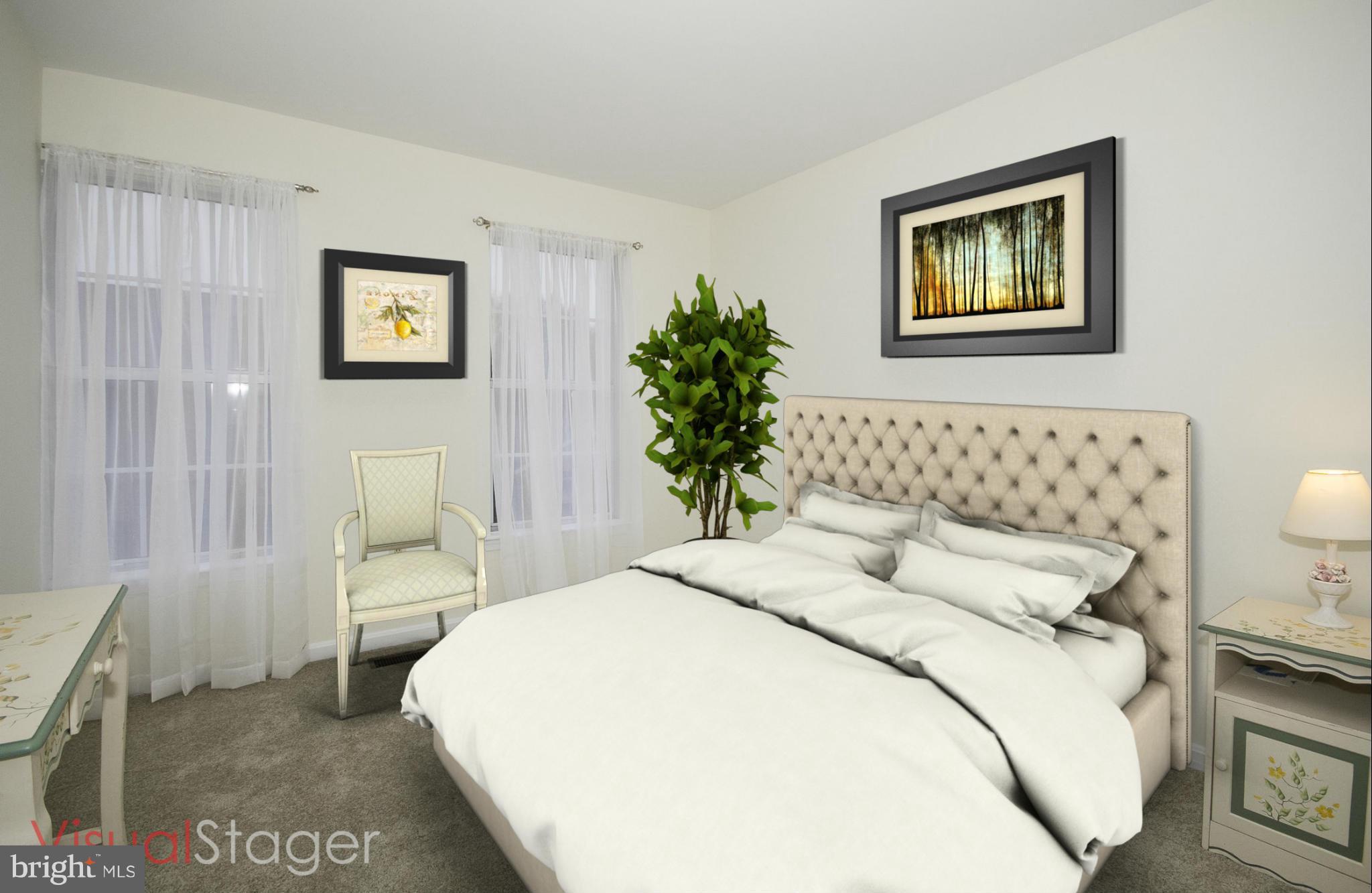 4309 Mispillion Road Baltimore, MD 21236 - Photo 18 of 29 a bedroom with a bed and a painting on the wall