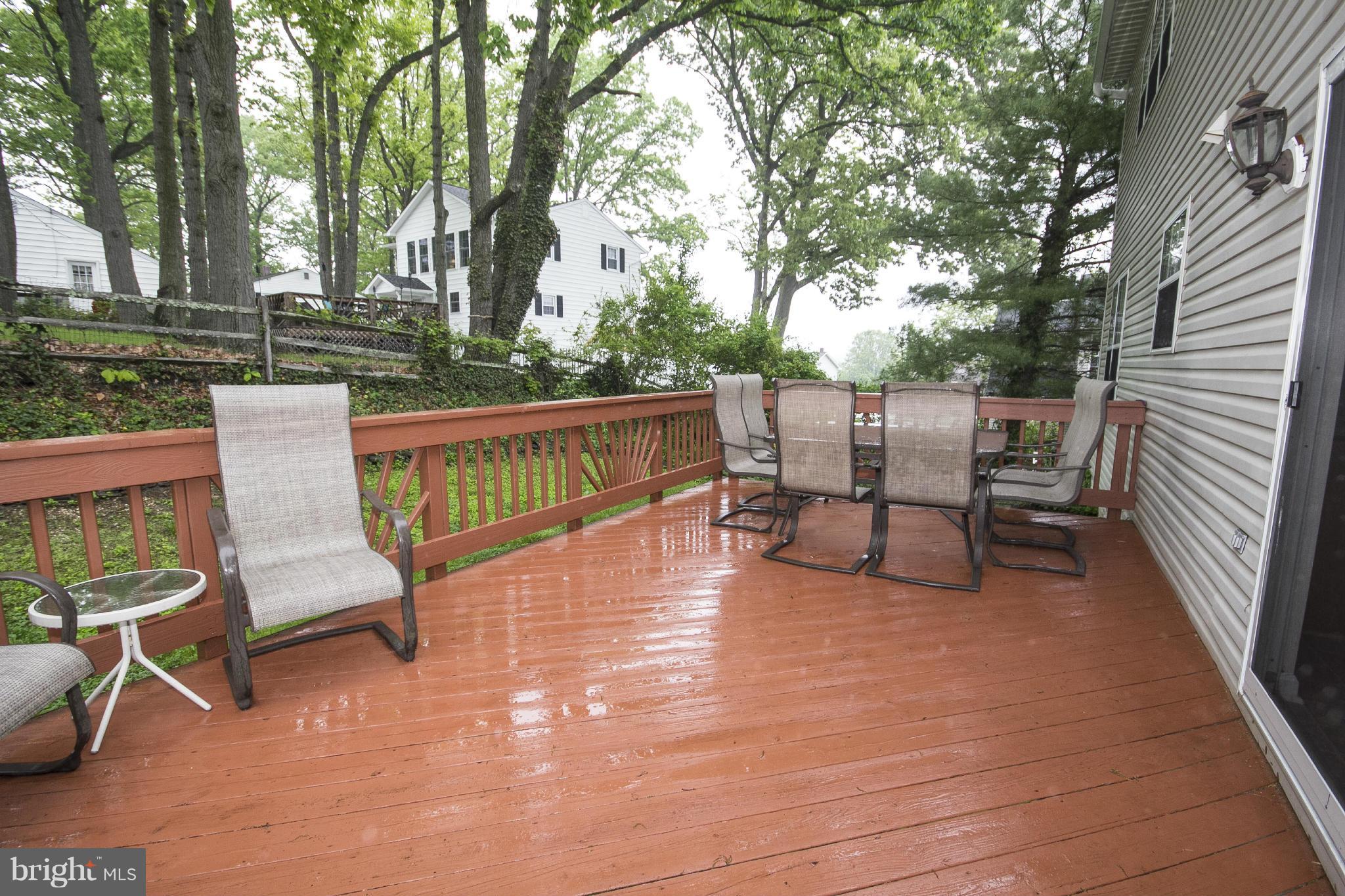 4309 Mispillion Road Baltimore, MD 21236 - Photo 28 of 29 a view of a patio with a table and chairs