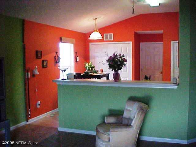 8717 Springtree Road Jacksonville, FL 32210 - Photo 4 of 7 Great Room open to Kitchen with Bfast Ba