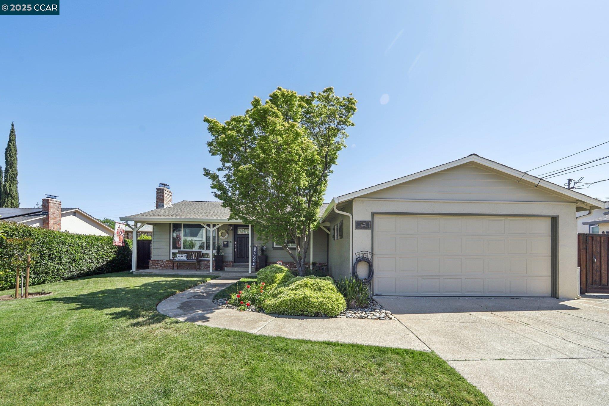 5521 Alaska Drive Concord, CA 94521 - Photo 1 of 1 a front view of a house with garden