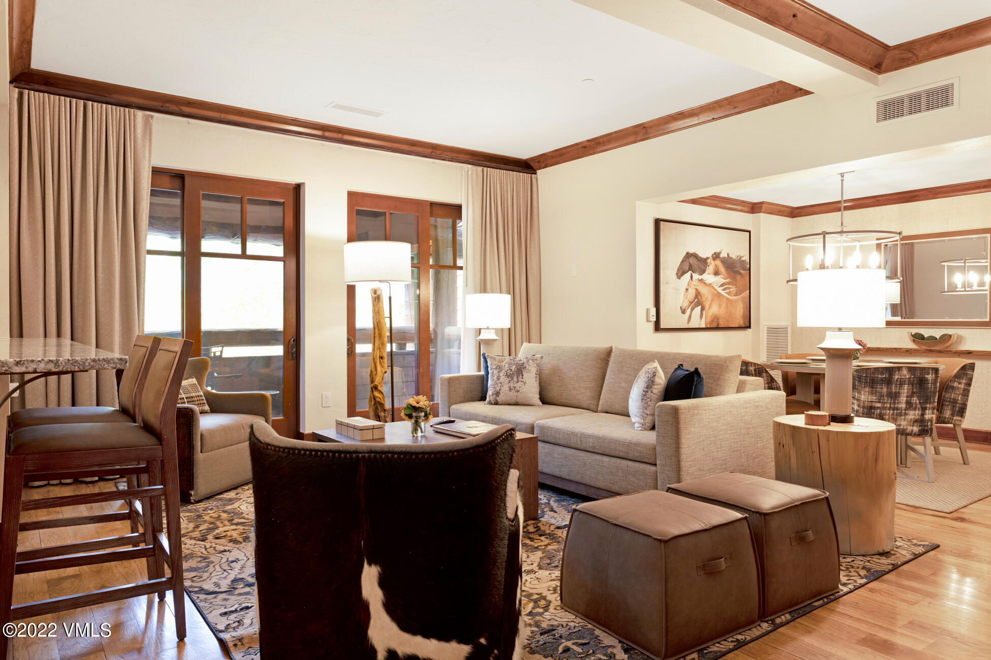 100 Bachelor Ridge Road, Unit 3704 Avon, CO 81620 - Photo 2 of 41 a living room with furniture and large windows