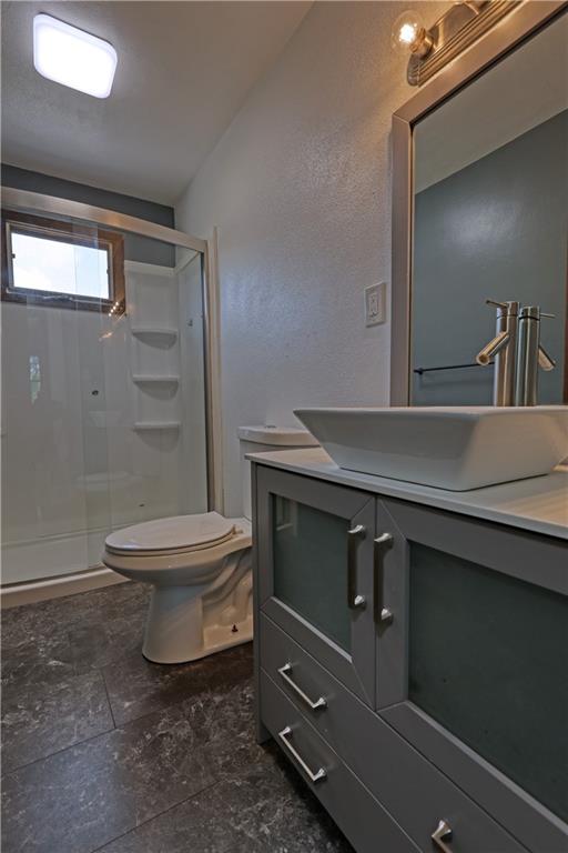 123 Noonen Street Rochester, PA 15074 - Photo 17 of 34 a bathroom with a sink a toilet and shower