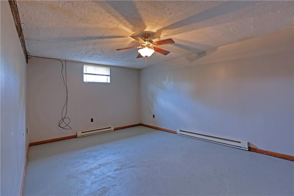 123 Noonen Street Rochester, PA 15074 - Photo 32 of 34 an empty room with closet and a chandelier fan