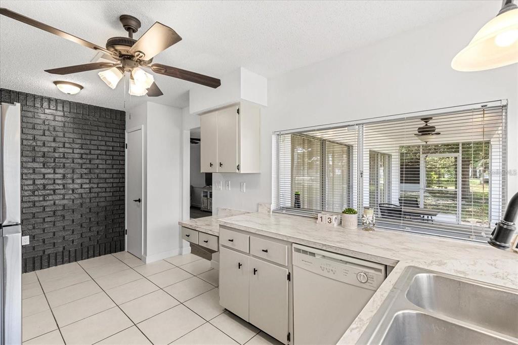 13013 Sawmill Way Hudson, FL 34667 - Photo 13 of 33 a very nice looking room with a large window
