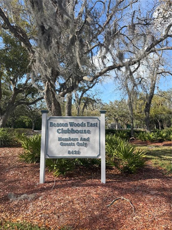 13013 Sawmill Way Hudson, FL 34667 - Photo 33 of 33 a sign on the side of the road