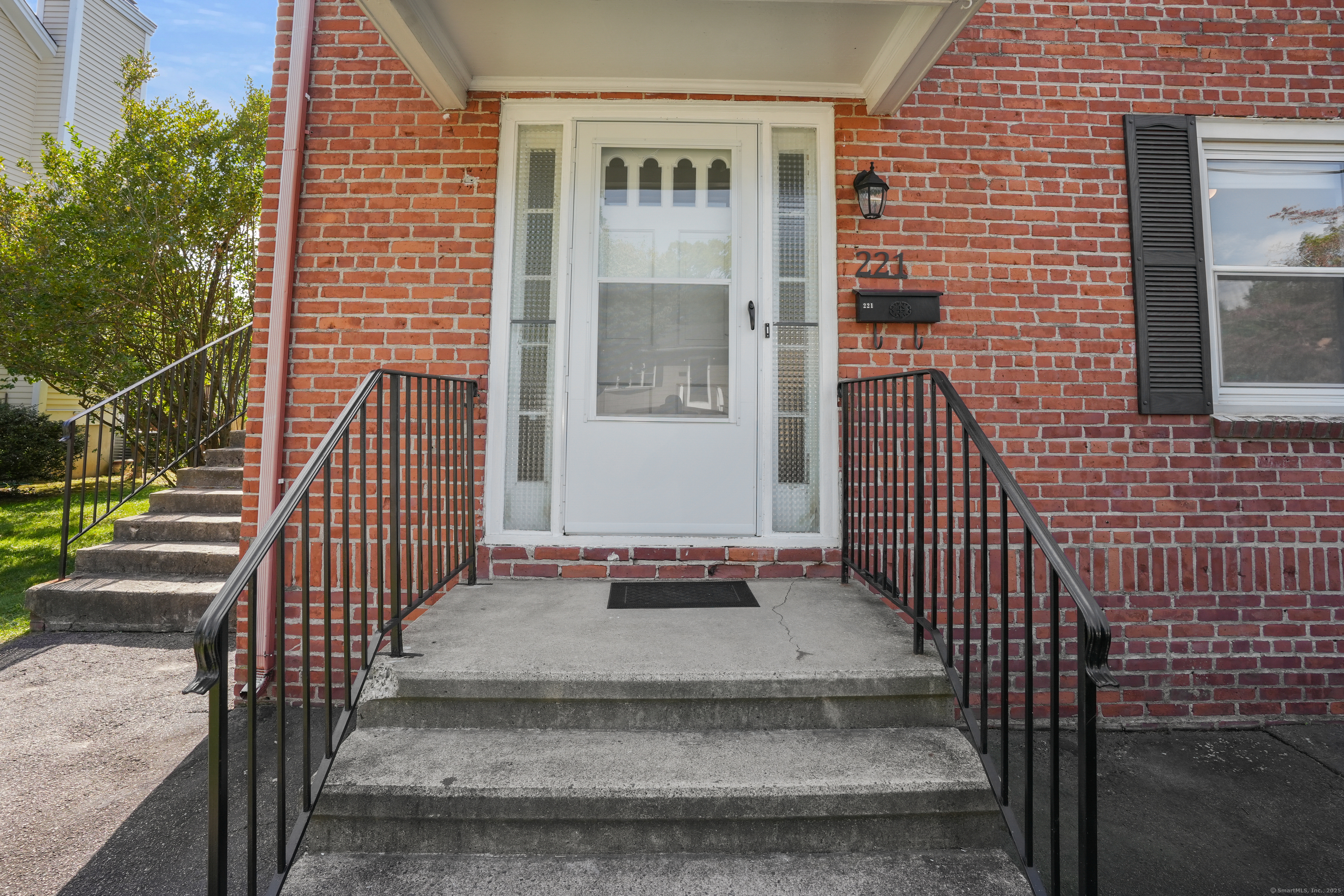 221 Hunyadi Avenue Fairfield, CT 06824 - Photo 2 of 39 a view of a balcony with a potted plant