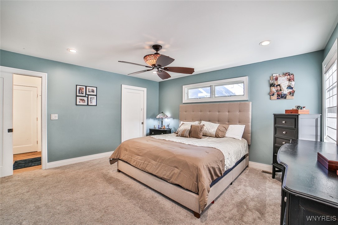 355 Okell Street Buffalo, NY 14220 - Photo 24 of 46 Love that transom window over the bed! Pocket doo