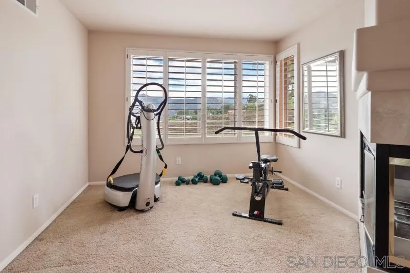 3674 Via Calabria Escondido, CA 92025 - Photo 29 of 49 a view of a room with gym equipment