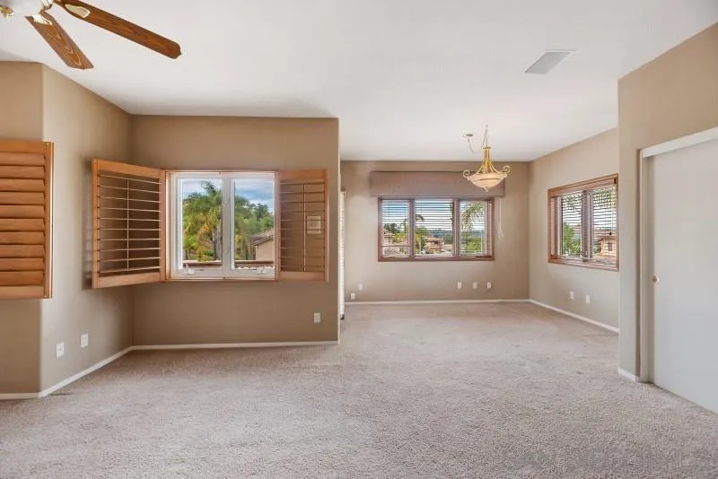 3674 Via Calabria Escondido, CA 92025 - Photo 34 of 49 an empty room with windows and entrance
