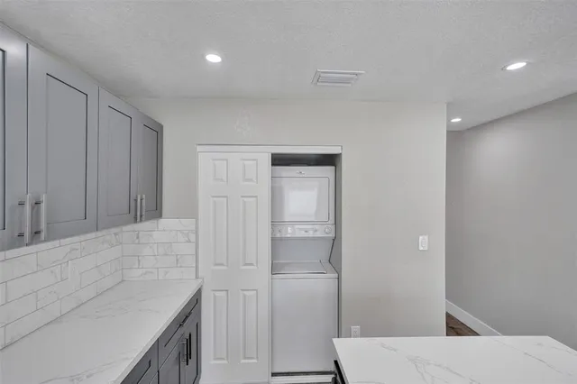 a bathroom with a bathtub and a sink