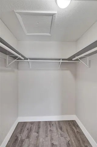 a view of an empty walk in closet