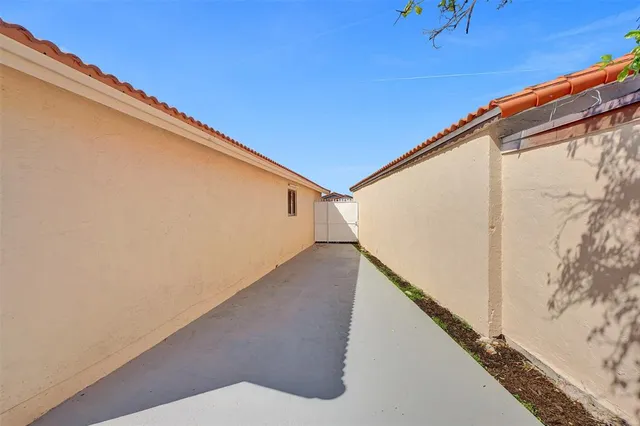 a view of a backyard of the house