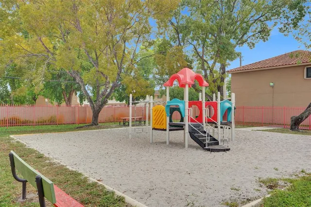 a view of a house with a street