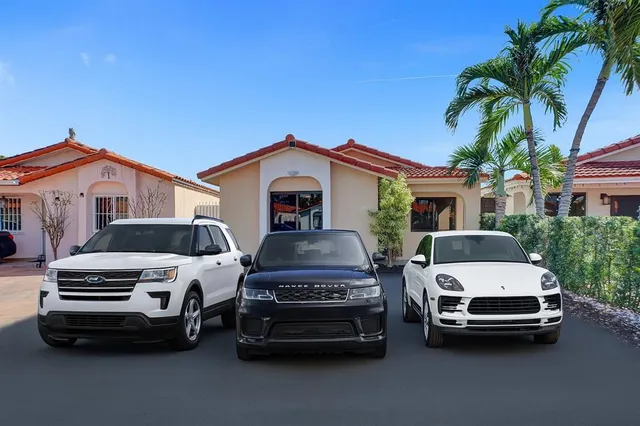 a view of a car parked in front of a house