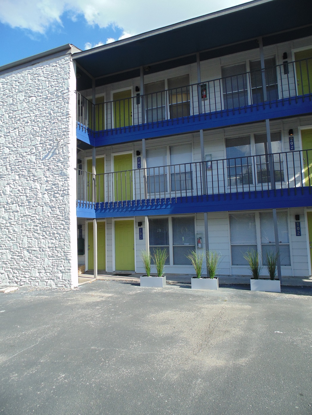 a view of pool with brick walls