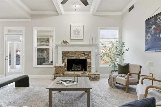 a view of a dining room with furniture and window