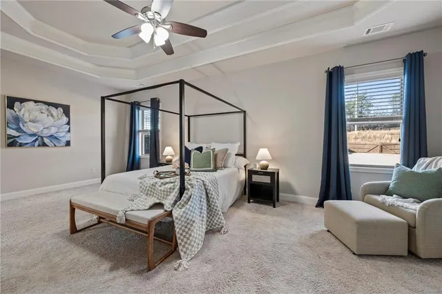 a bathroom with a tub and shower