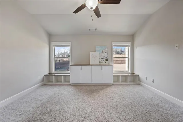 a view of a house with sitting area and furniture