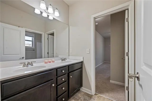 a view of a garden with a building in the background