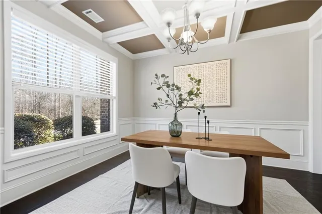 a view of a big room with windows and cabinet