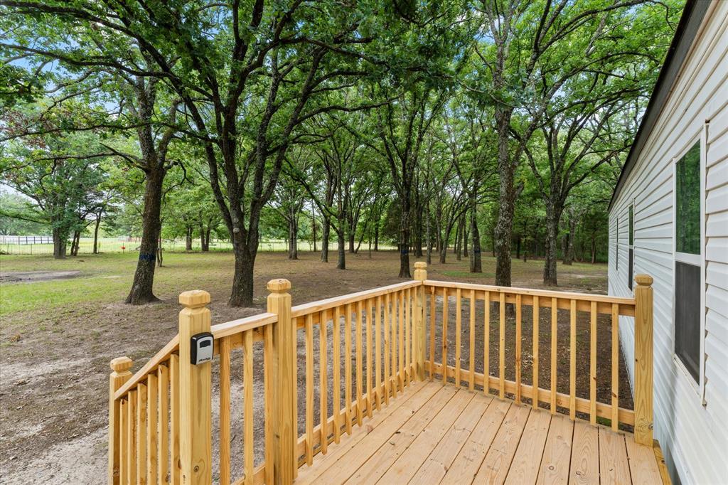 367 Box Road Gun Barrel City, TX 75156 - Photo 23 of 25 a view of deck with wooden floor and fence