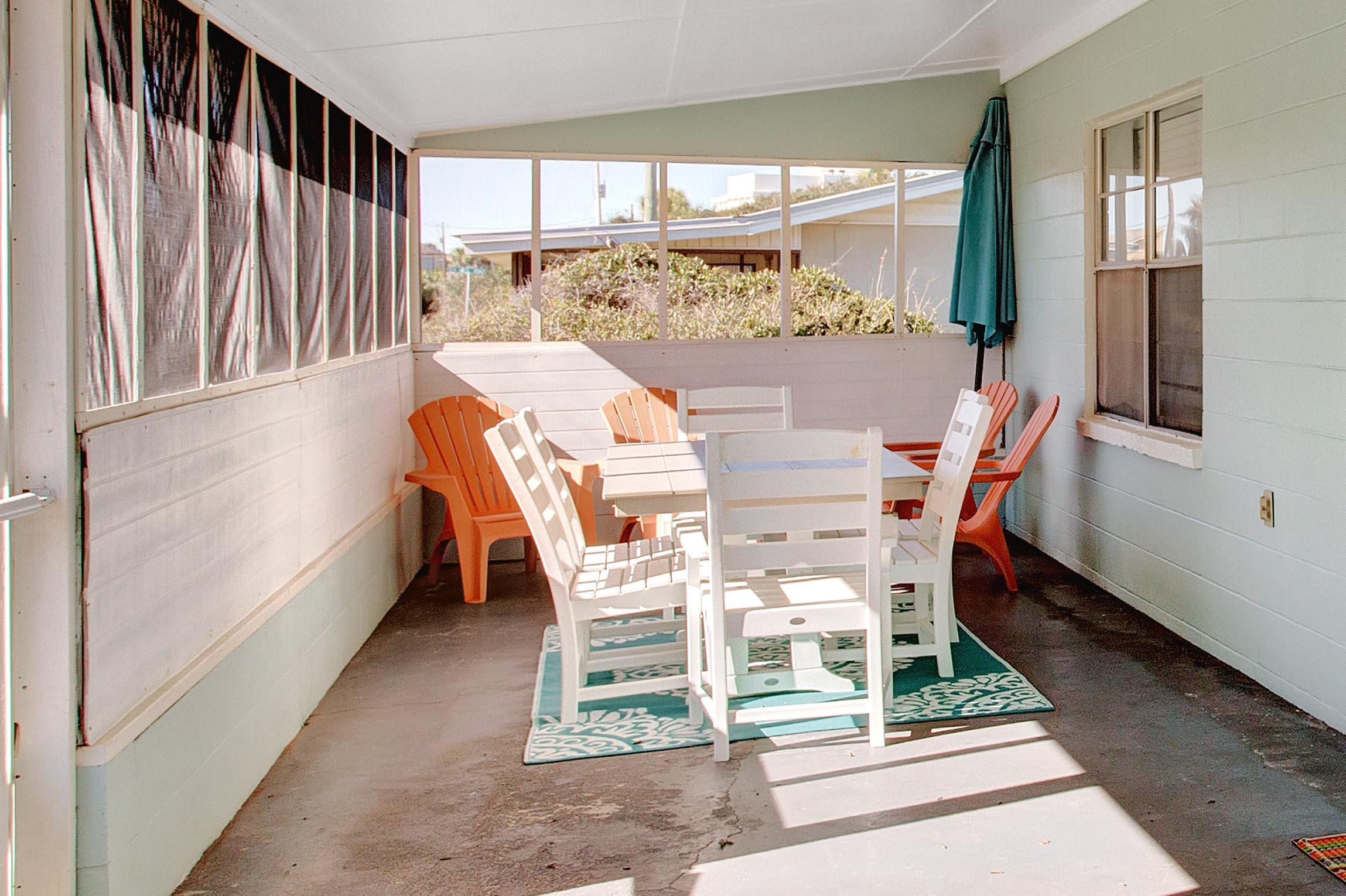 545 Blue Mountain Road Santa Rosa Beach, FL 32459 - Photo 16 of 27 a view of a dining room with furniture window and outside view