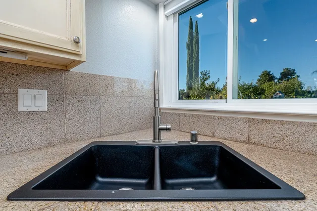 a bathroom with a sink and a bathtub