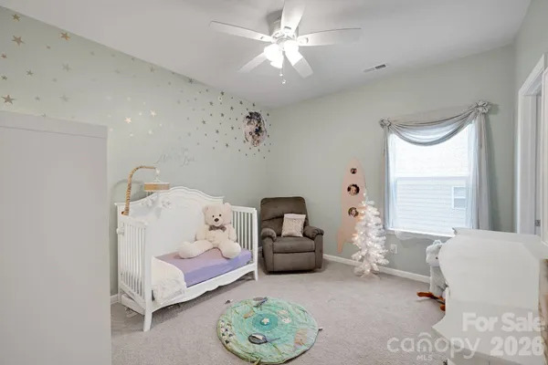 a view of kitchen with furniture and toys