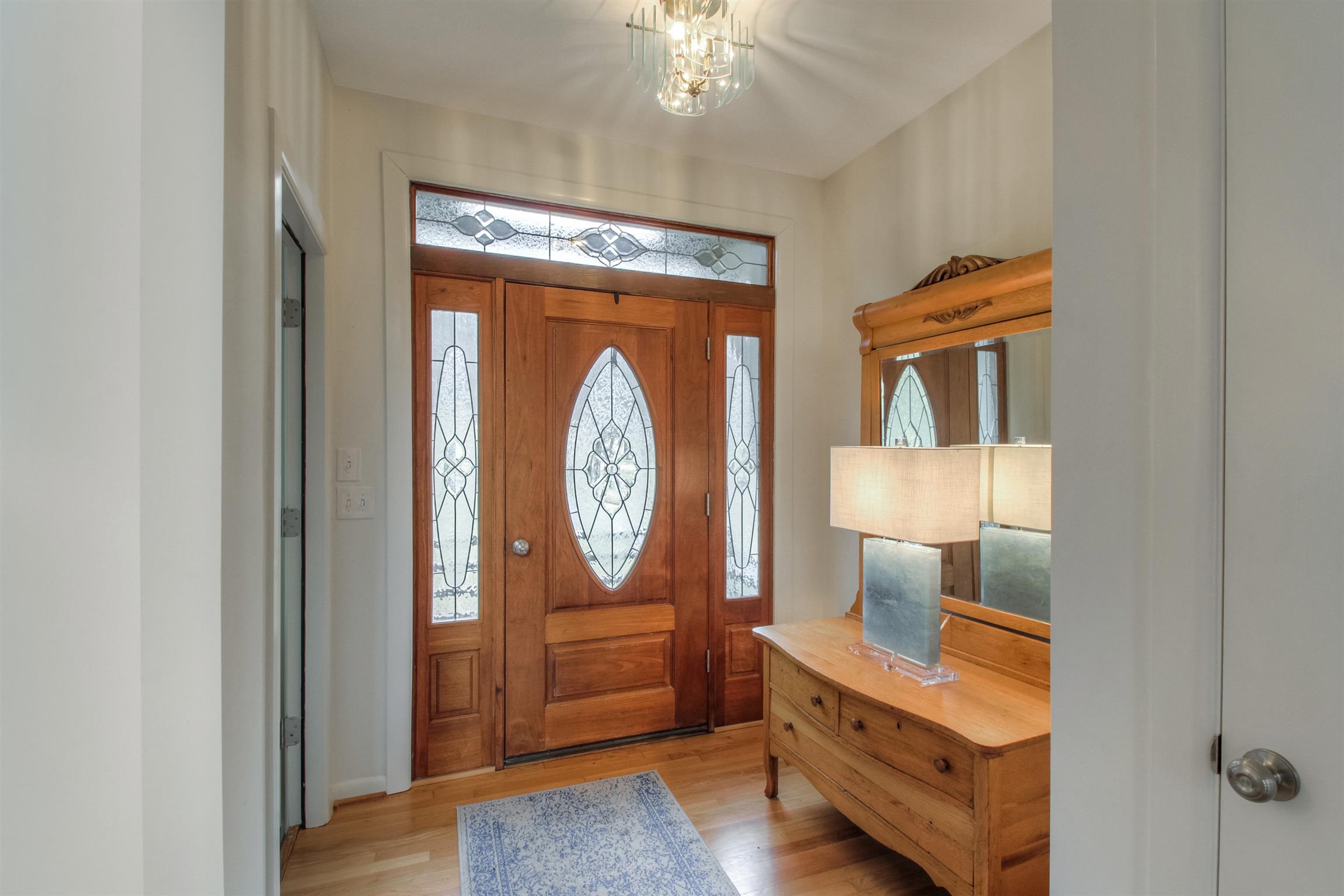 788 High Point Ridge Road Franklin, TN 37069 - Photo 12 of 30 a room with painting on the wall and a mirror