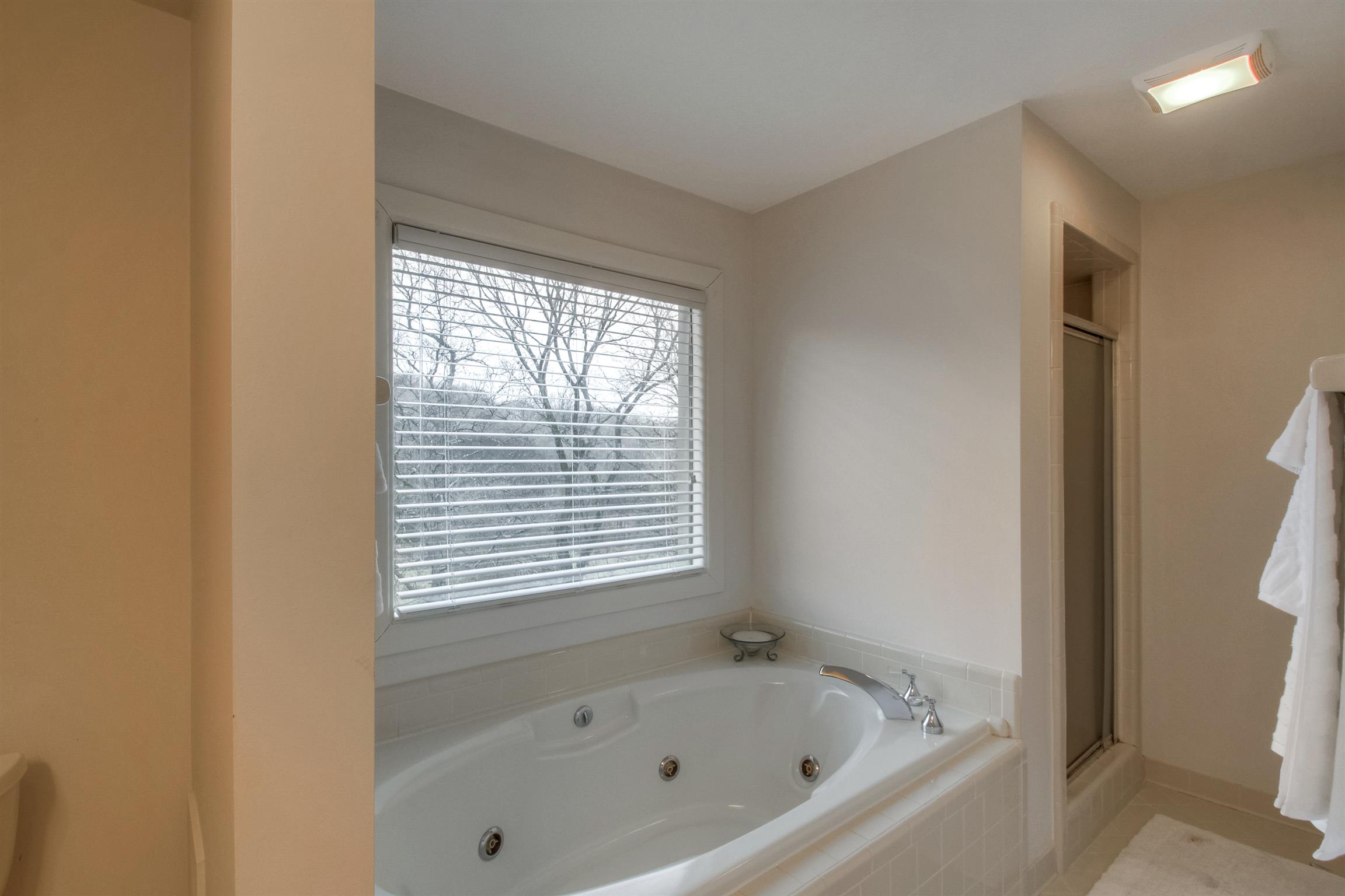 788 High Point Ridge Road Franklin, TN 37069 - Photo 27 of 30 a white bath tub sitting next to a window