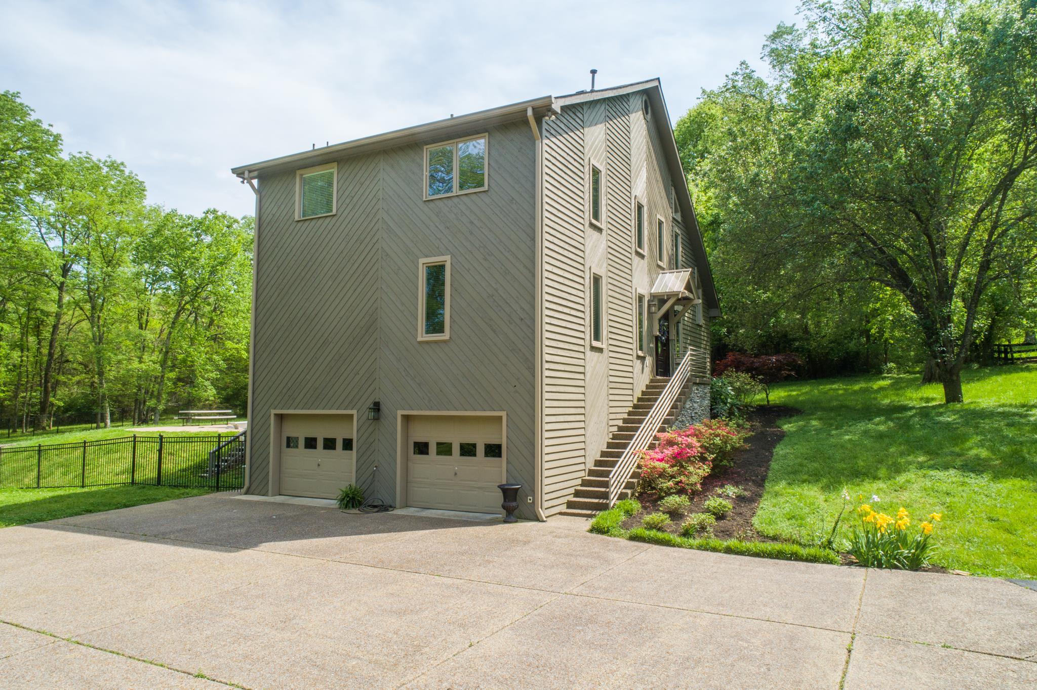 788 High Point Ridge Road Franklin, TN 37069 - Photo 5 of 30 a front view of a house with a yard