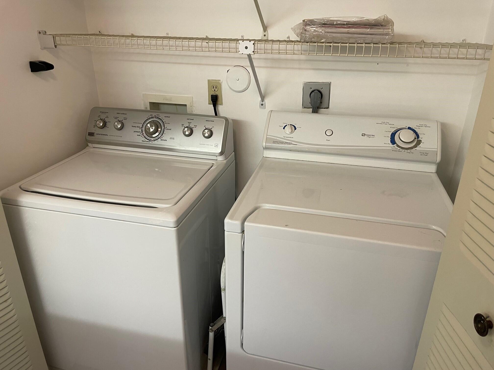 6485 Chasewood Drive, Unit C Jupiter, FL 33458 - Photo 15 of 23 a utility room with dryer and washer
