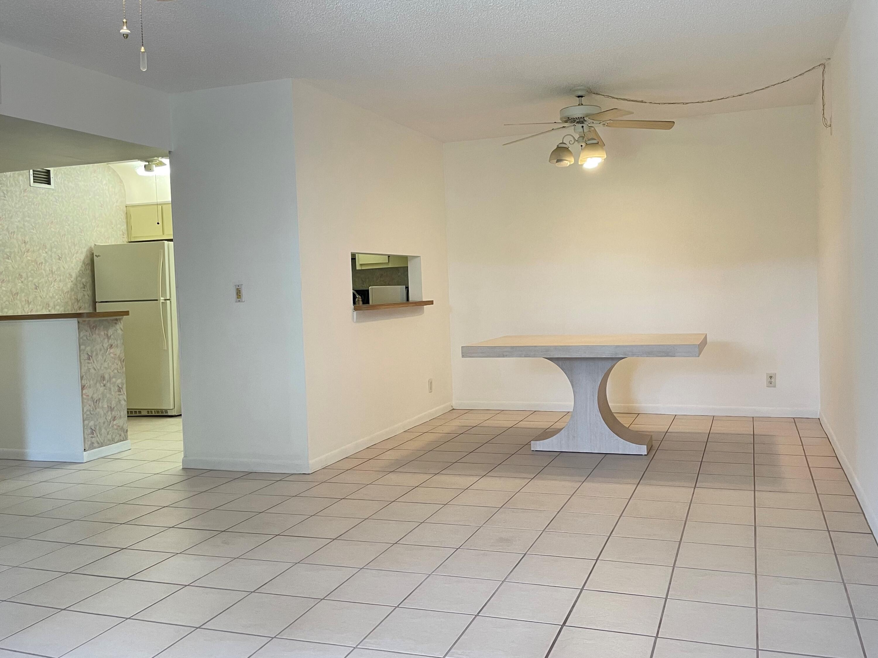 6485 Chasewood Drive, Unit C Jupiter, FL 33458 - Photo 6 of 23 a view of a livingroom with a furniture